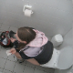 A daring, but lucky cameraman manages to record a girl shitting in a public restroom toilet stall. Some poop action and movement can be seen behind her ass. Product is slightly visible when she sits forward to wipe her ass. Over 2.5 minutes.